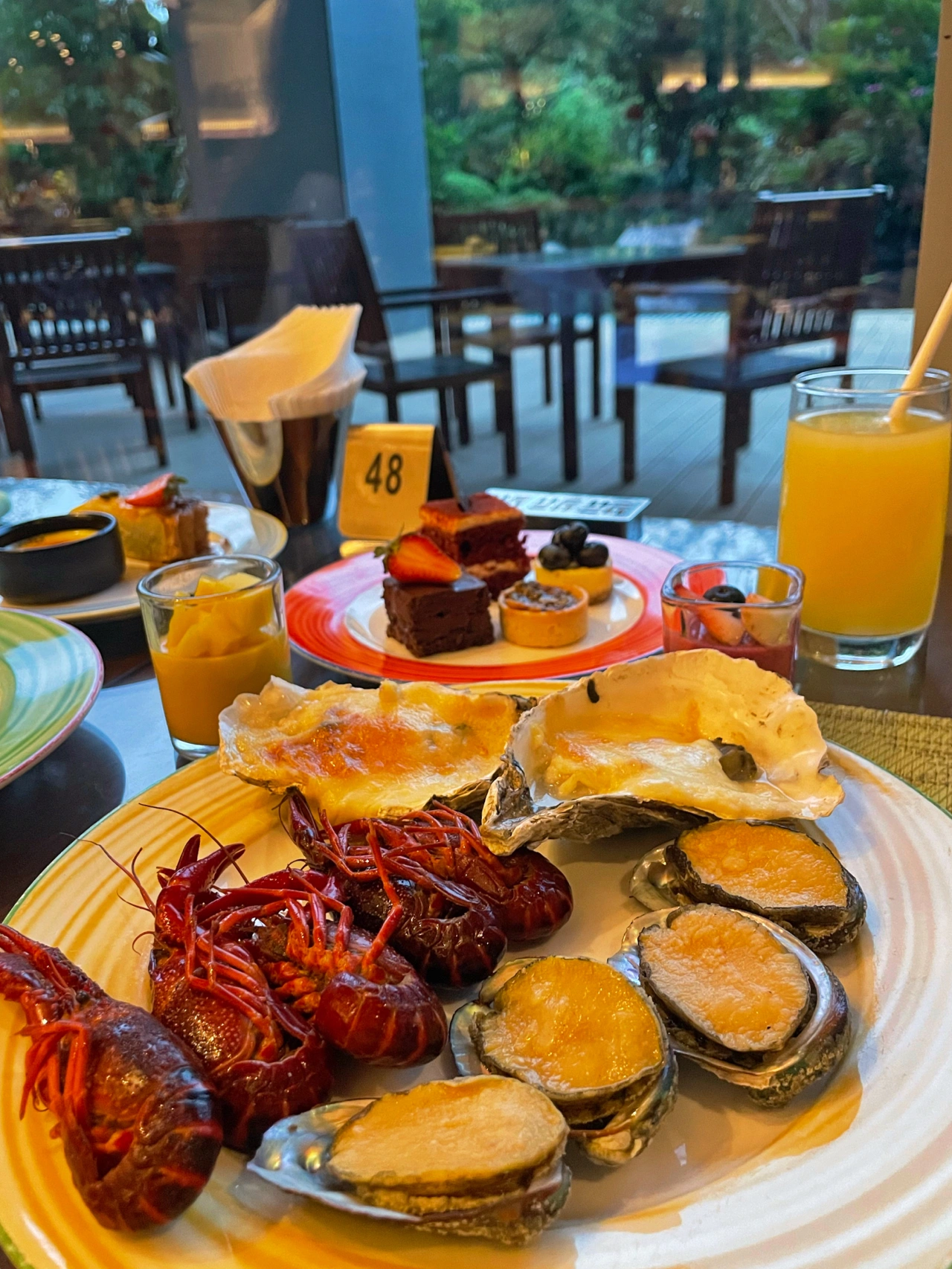 2厦门海沧融信华邑酒店美食海鲜水果泡澡窗外背影(酒店生态 餐厅环境很有夏天的感觉)-喵神素材库
